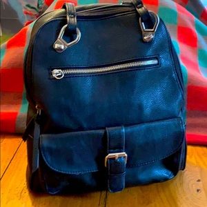 Madden girl backpack/pocketbook combo.